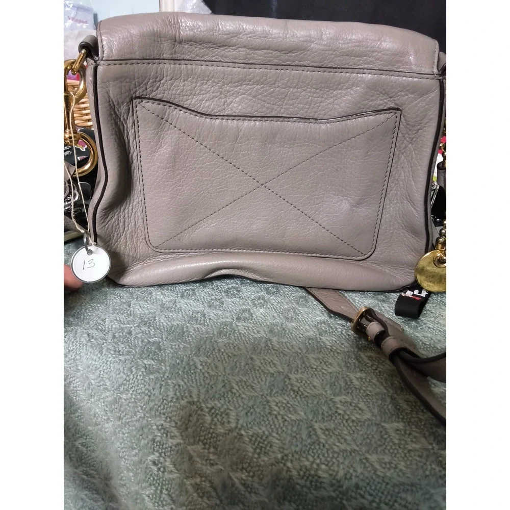 13. Marc Jacobs Recruit Nomad Grey Pebbled Leather Crossbody Saddle Bag M0008137